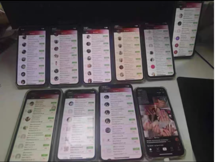 工位上一排手机同时跑一机二十号